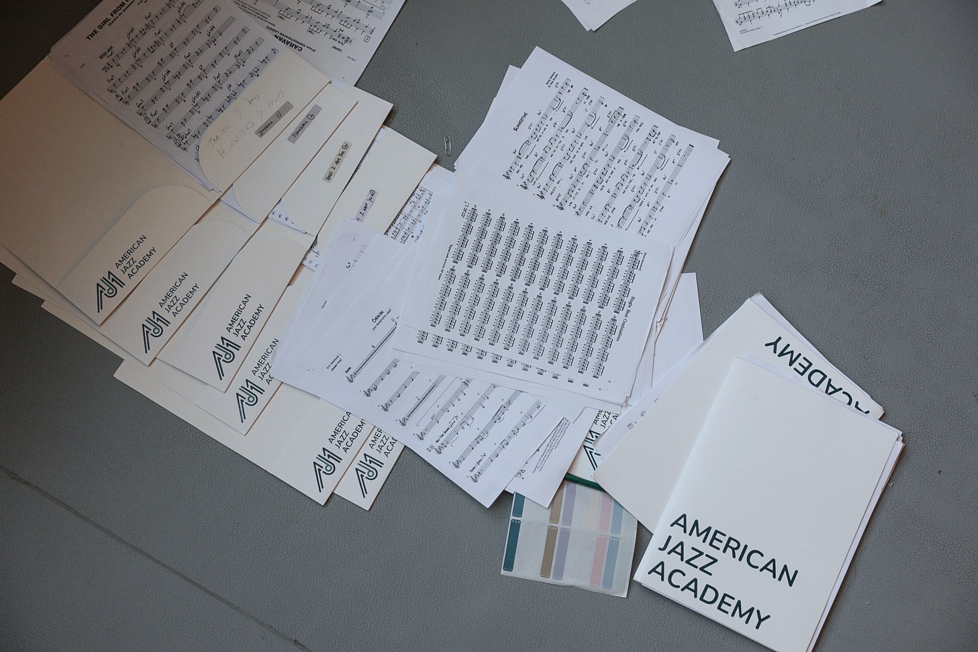 AJA branded folders and collateral