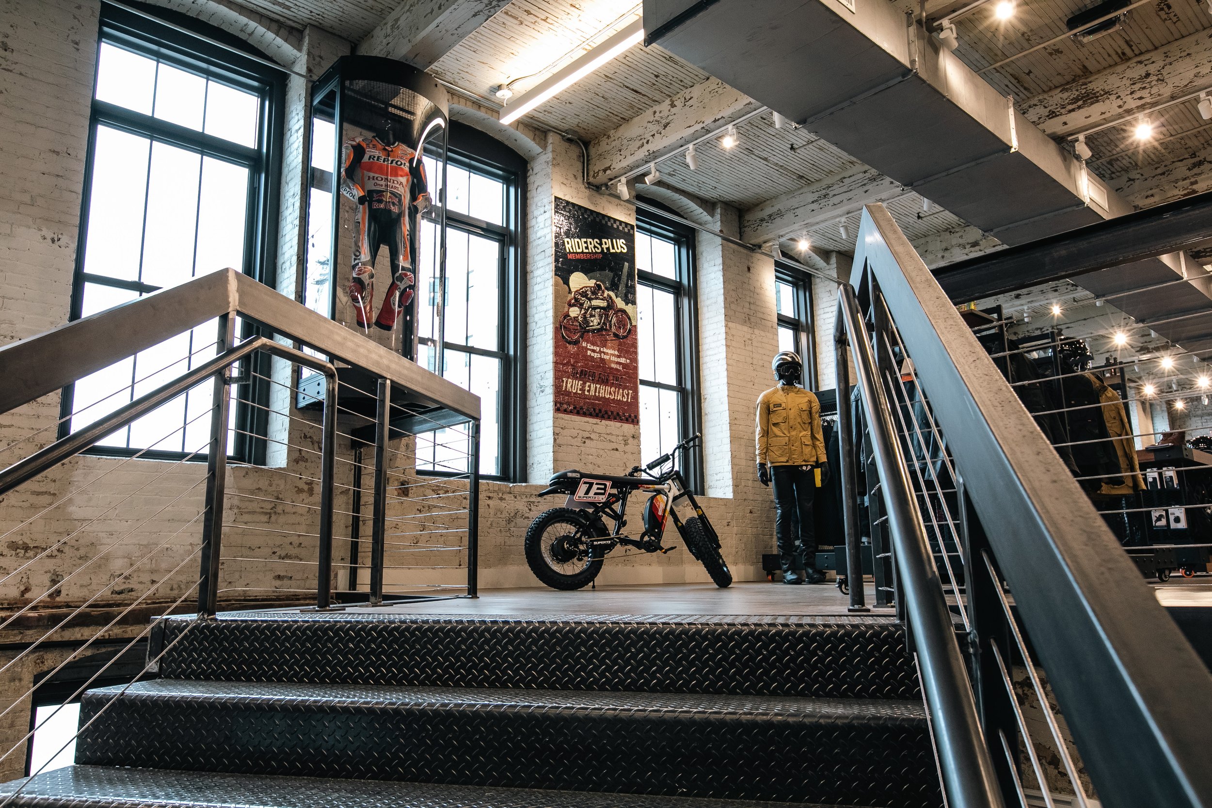 Stairwell with painted RevZilla floor graphic below